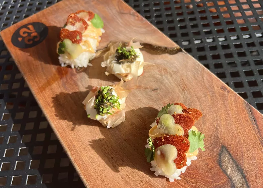 Small bites on a board.