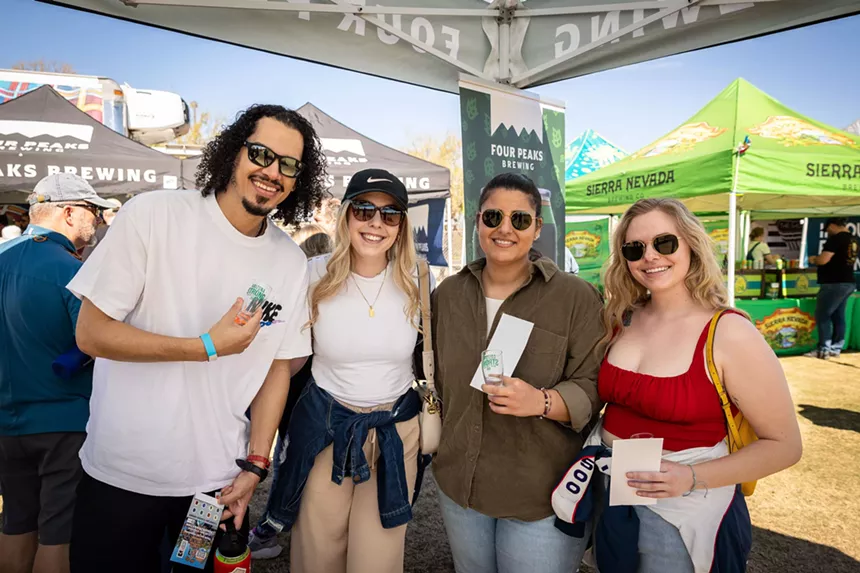 Four friends in a beer tent.