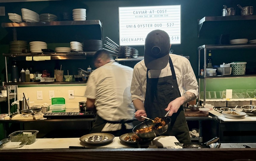Chefs work in the open kitchen at Pretty Penny.
