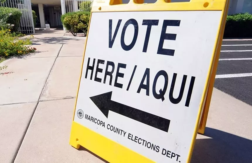 Vote here sign