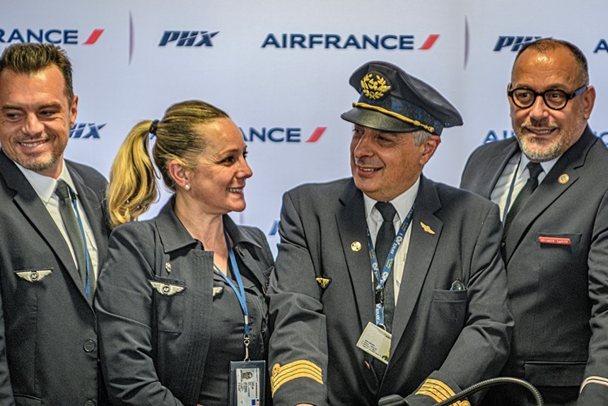 Air France pilots and flight attendants pose for a photo