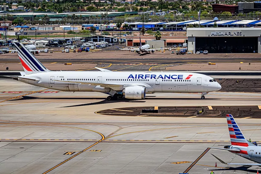 An Air France jet taxis on the runway.