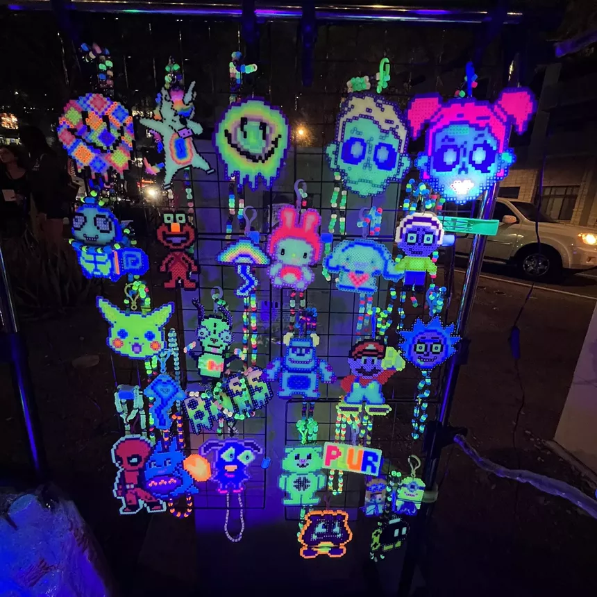 Kandi for sale on a sidewalk.