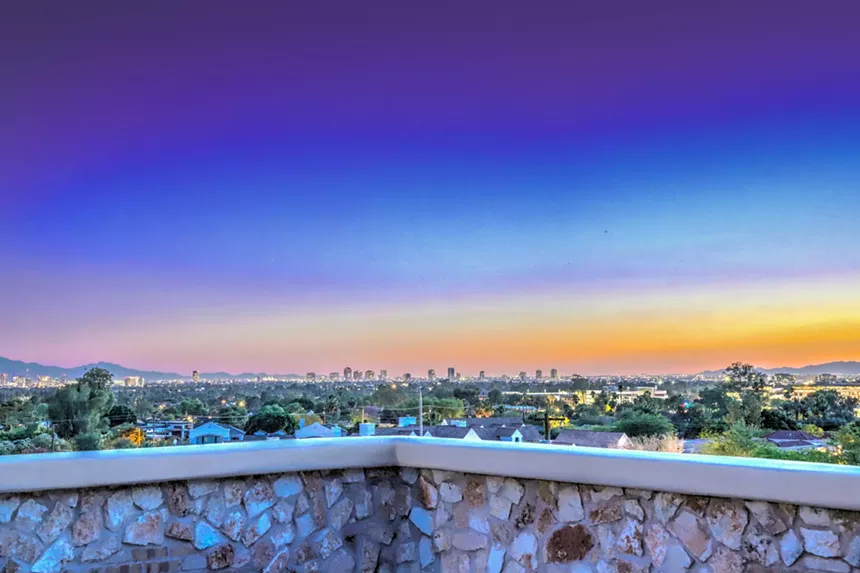 Views of a city at dusk.