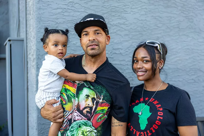 A couple with a baby.
