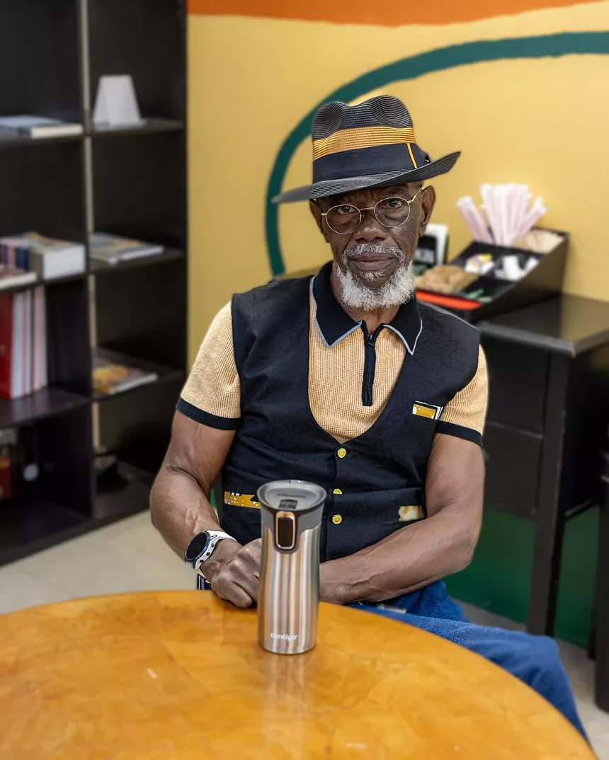 A man sitting at a table.