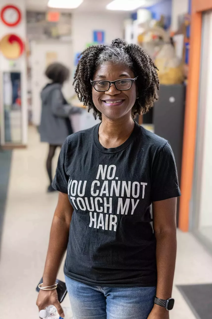 A woman smiling.