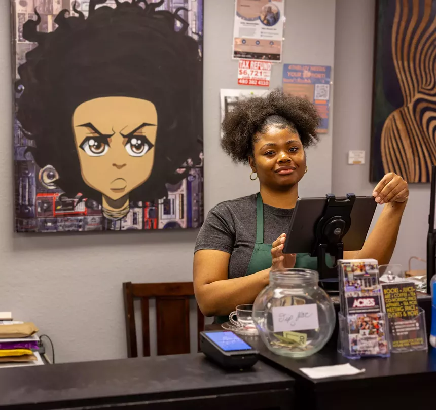 A woman working at a store.