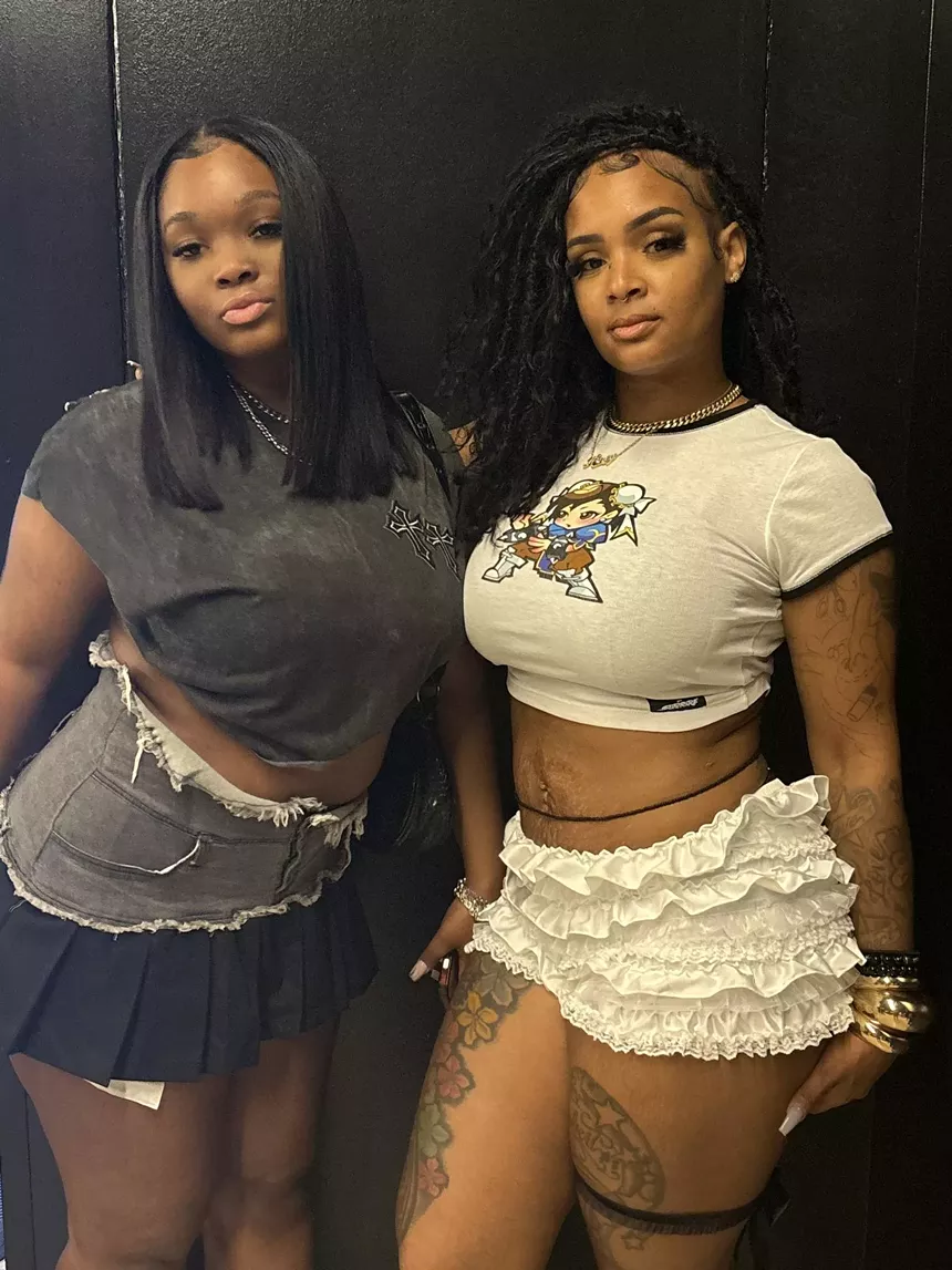 Two women at a concert.