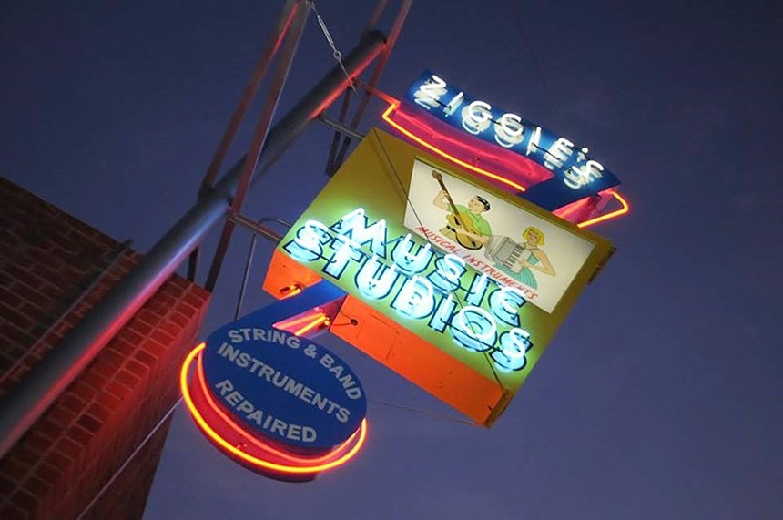 A neon sign at night.
