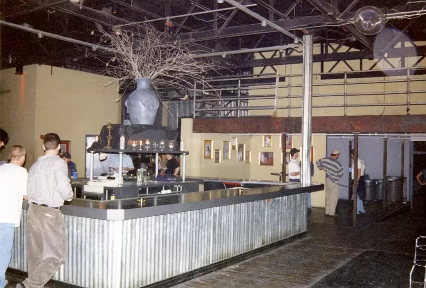 A bar inside an empty nightclub.