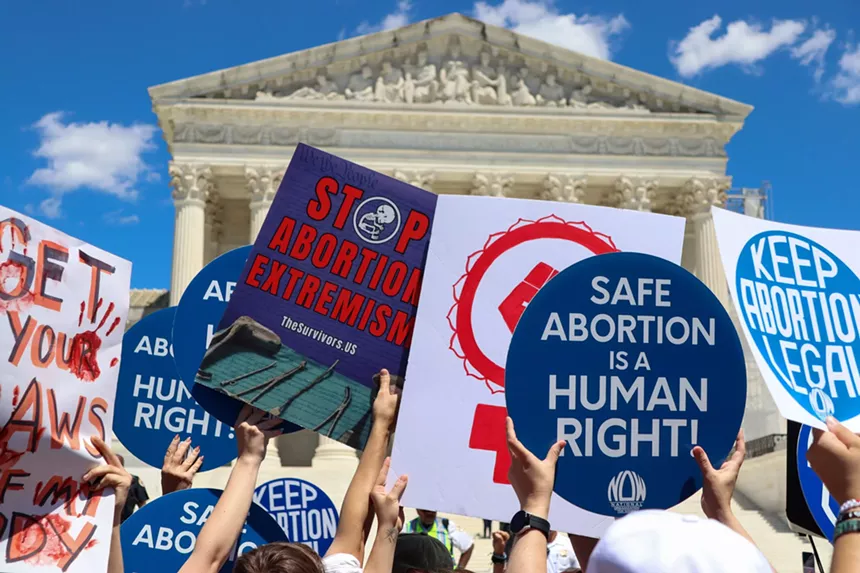 Pro-abortion protest signs in front of the U.S. Supreme Court