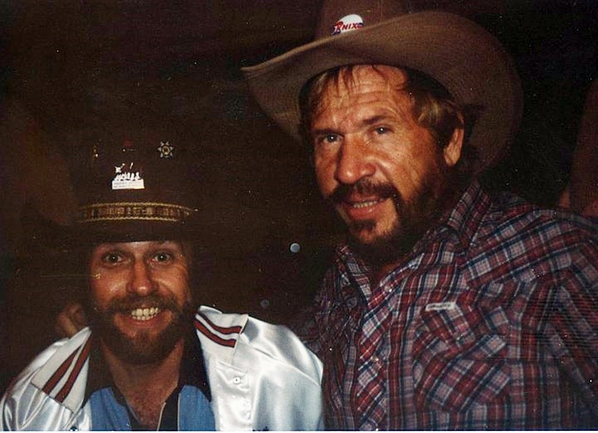 Two men in cowboy hats.