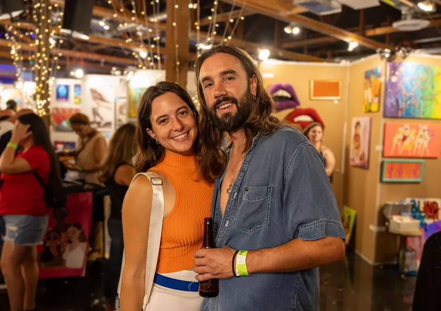 A couple posing for a photo.