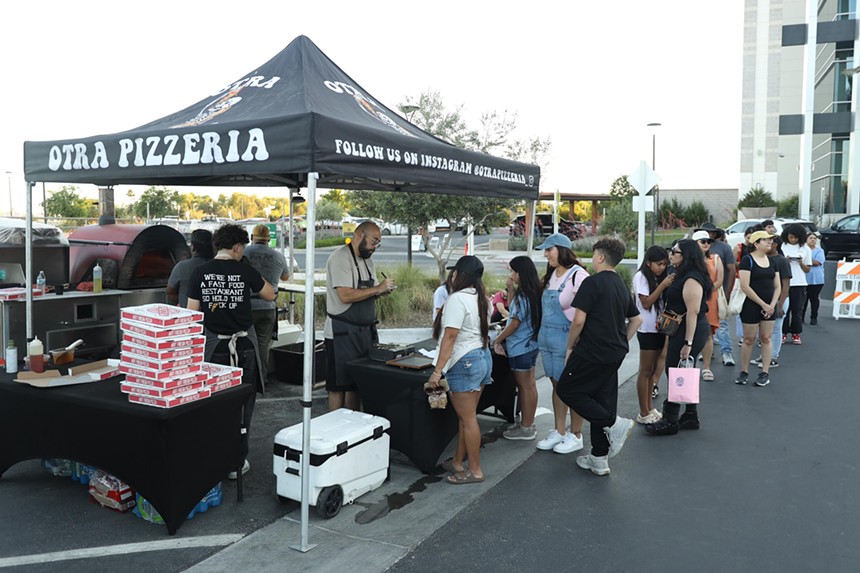 Line at Otra Pizzeria.