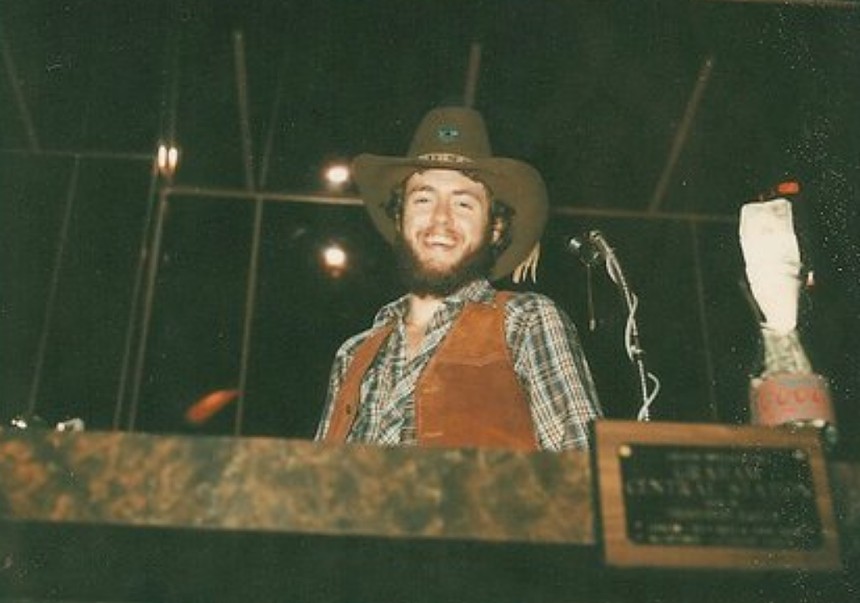 A vintage photo of a man in Western wear.