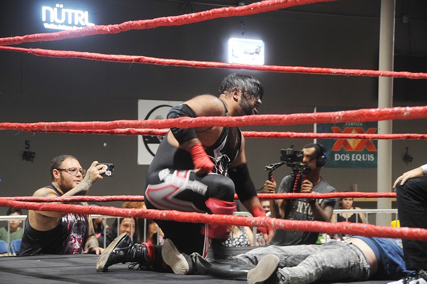 A pro wrestling match between two wrestlers.