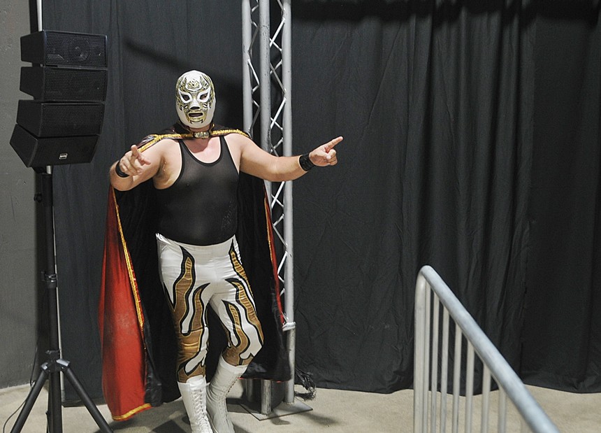 A masked professional wrestler.