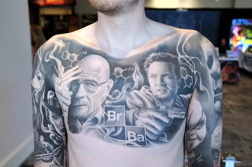 A "Breaking Bad" tattoo on a person's chest.