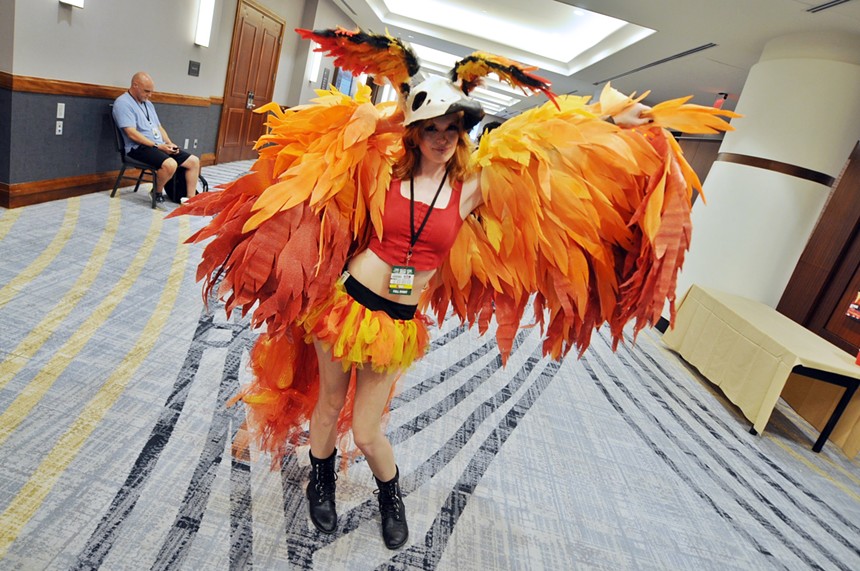 A woman dressed as a mythical Phoenix.