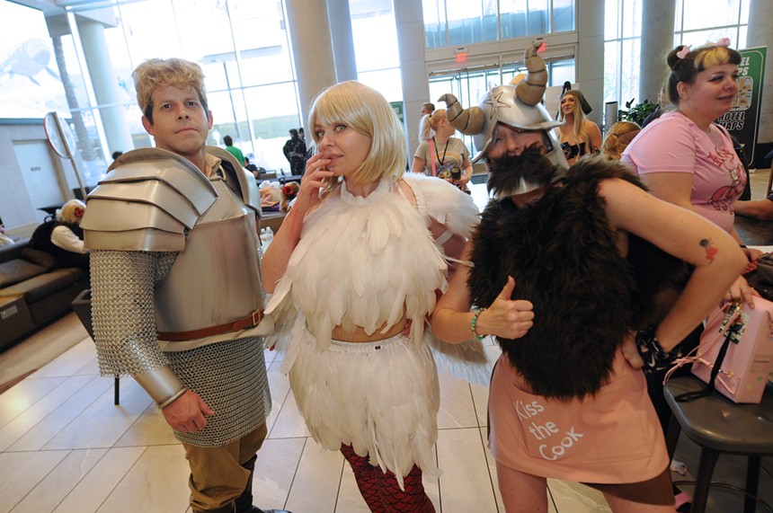 Three people in costume.