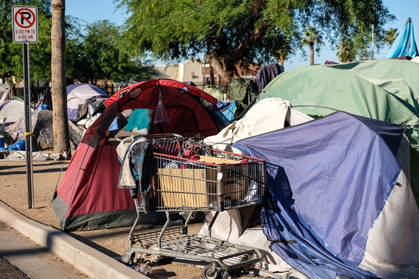 A row of tents at a homeless encampment