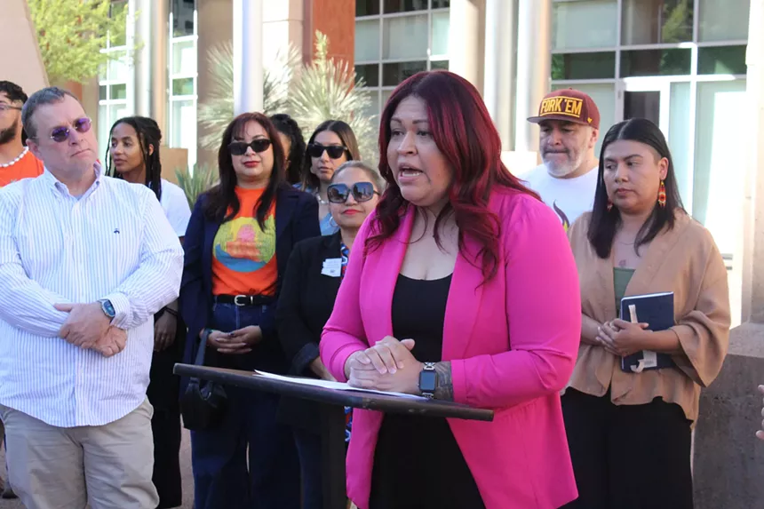 anna hernandez at a press conference