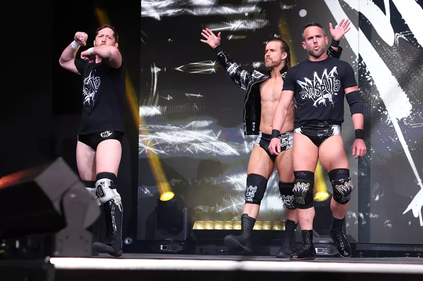 Wrestlers on stage