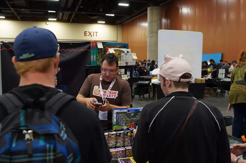 People at a trading card show