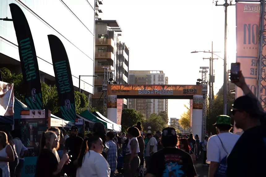 people walk through the buds-a-palooza festival