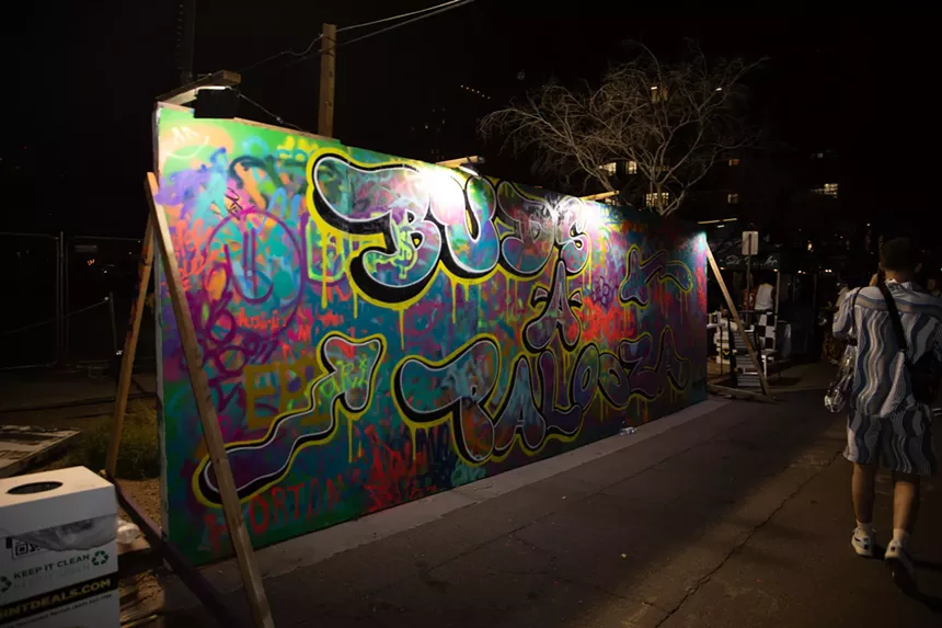 a spraypainted "buds-a-palooza" mural