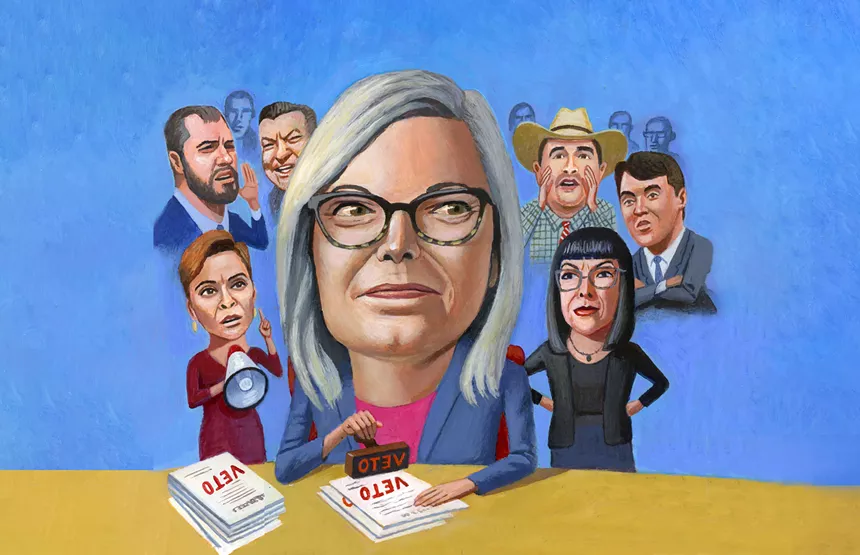 Governor Katie Hobbs surrounded by Republican critics, including (clockwise from bottom left) Kari Lake; Senators Jake Hoffman, Anthony Kern, and Thomas Shope; Turning Point USA co-founder Charlie Kirk; and Senator Justine Wadsack.