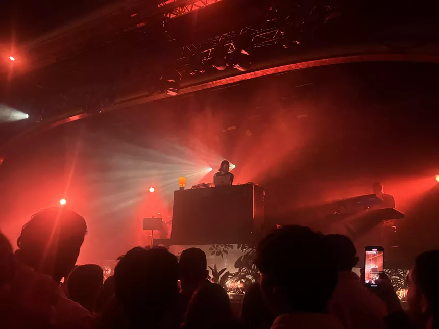 Dance music DJ performs.