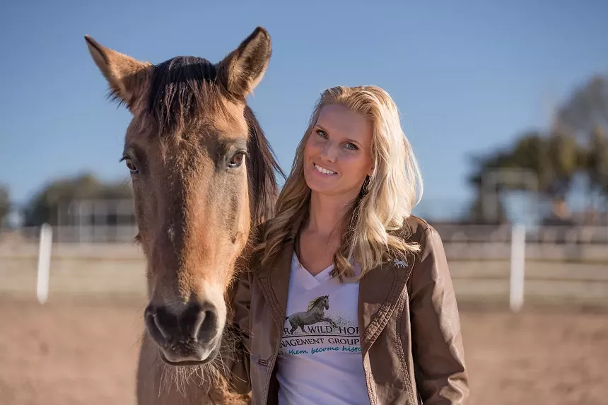 a woman and a horse