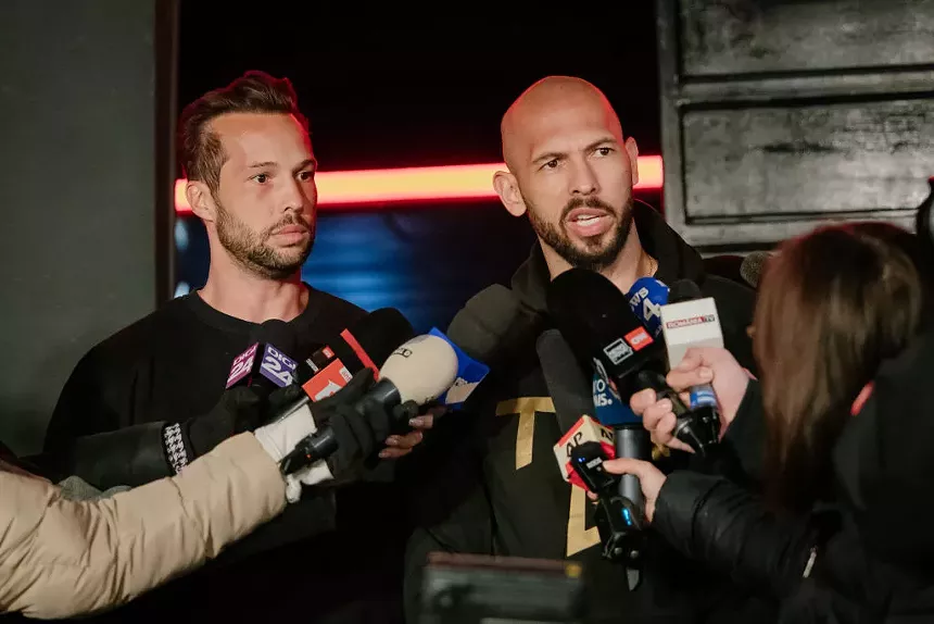 tristan and andrew tate at a press conference