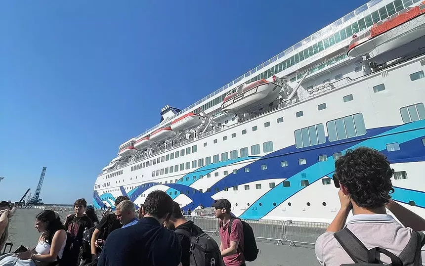 people outside a cruise ship