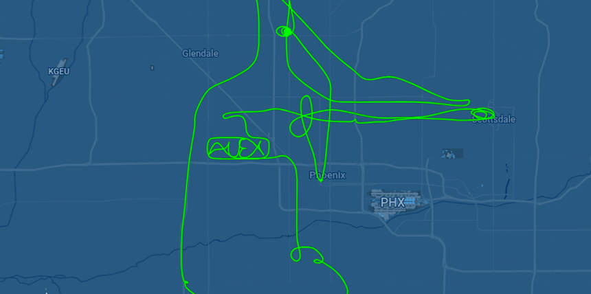 a flgiht path of a helicopter showing it spelling "ALEX"