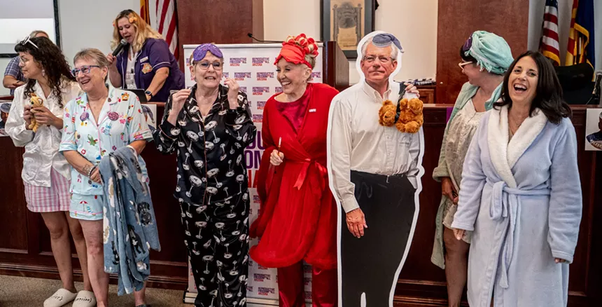 people line up in pajamas