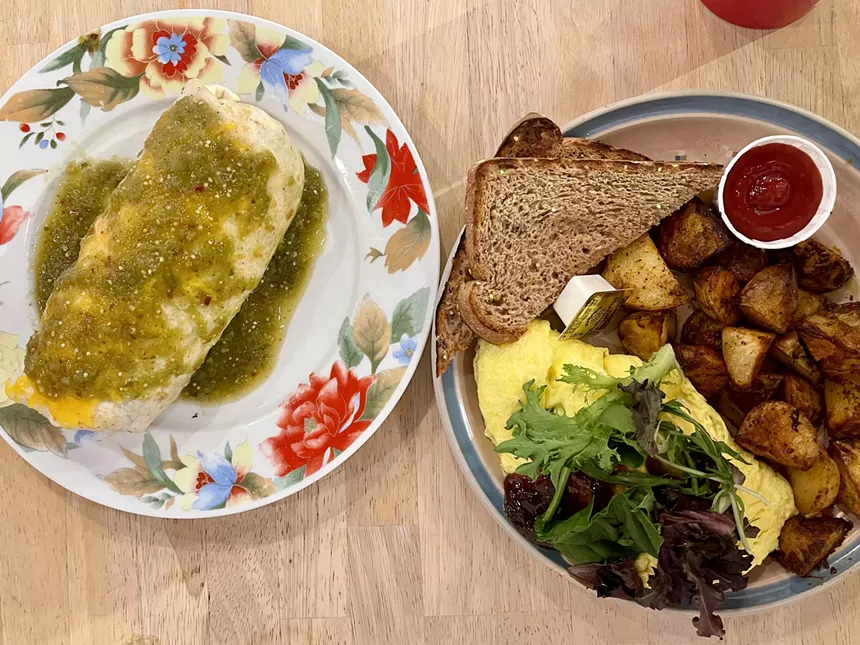A burrito and omelet from The Toasted Owl Cafe.