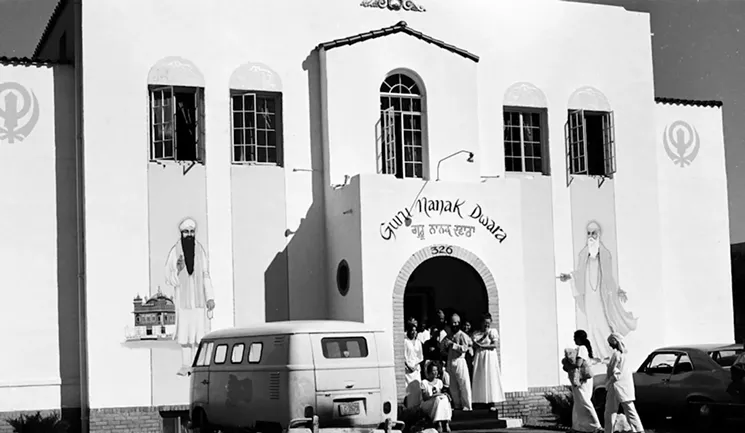 In the early 1970s, roughly 140 kundalini yoga practitioners, including Singh, lived in this ashram at 326 East McDowell Road. - NIDHAN SINGH