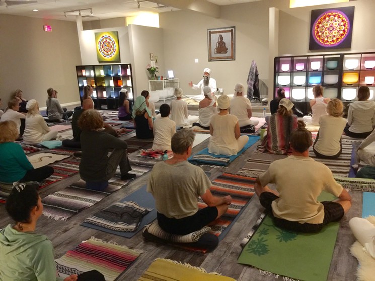 Singh's "Sunday Connection" kundalini yoga classes average 50-60 students each week. - COLLEEN O'DONNELL PIERCE