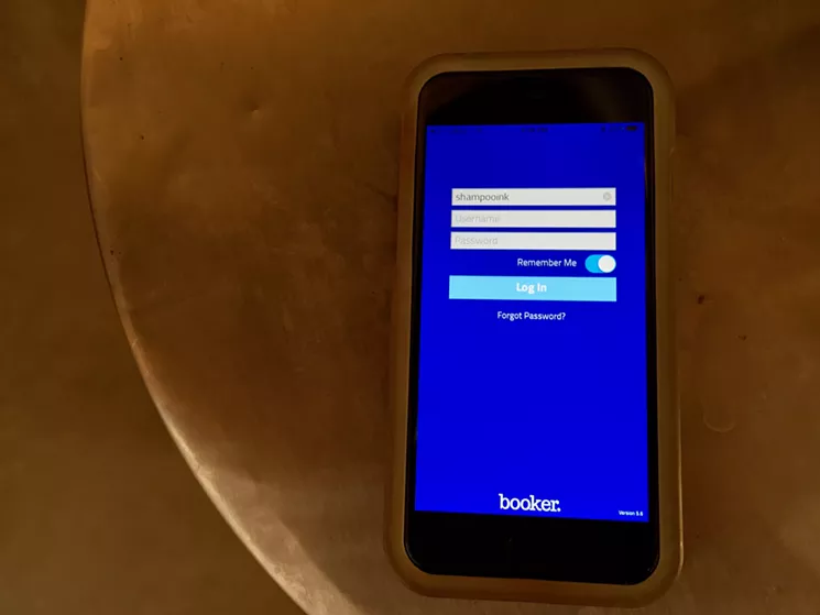 The Booker app allows Escoto to run around while keeping an eye on the salon's schedule and his own. - LAUREN CUSIMANO