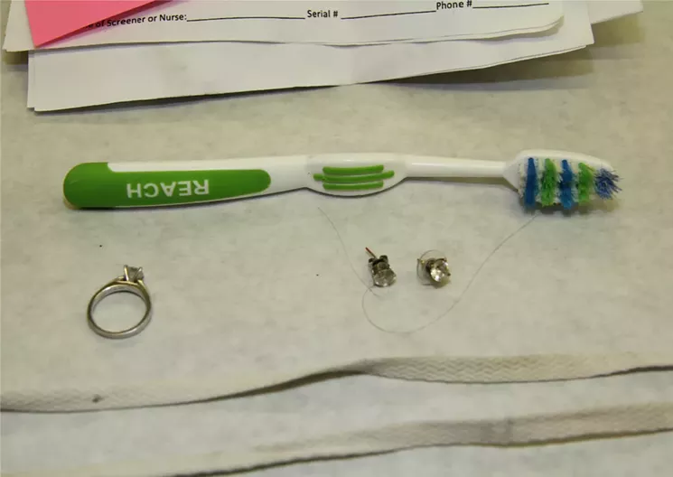 A police photograph of Violette's property, confiscated at the Phoenix police northern command station. - PHOENIX POLICE DEPARTMENT