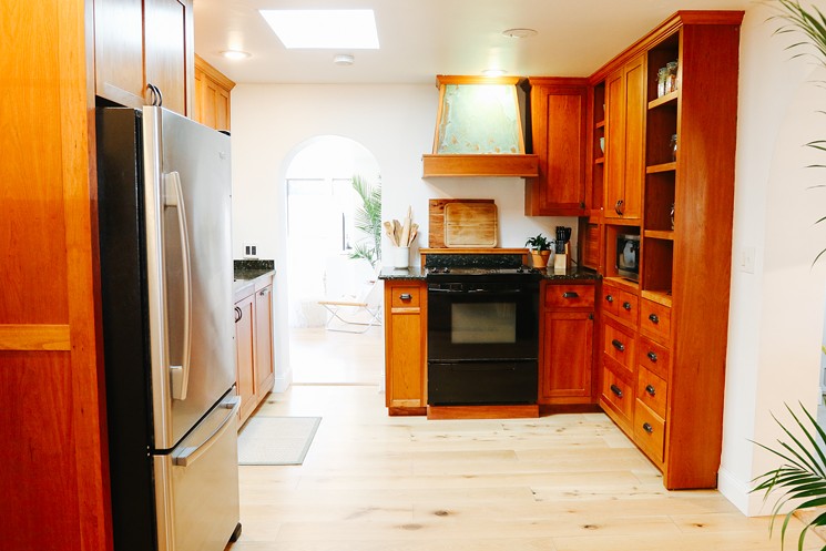 The cabinets in the kitchen were created by Dana Hummels. - EVIE CARPENTER