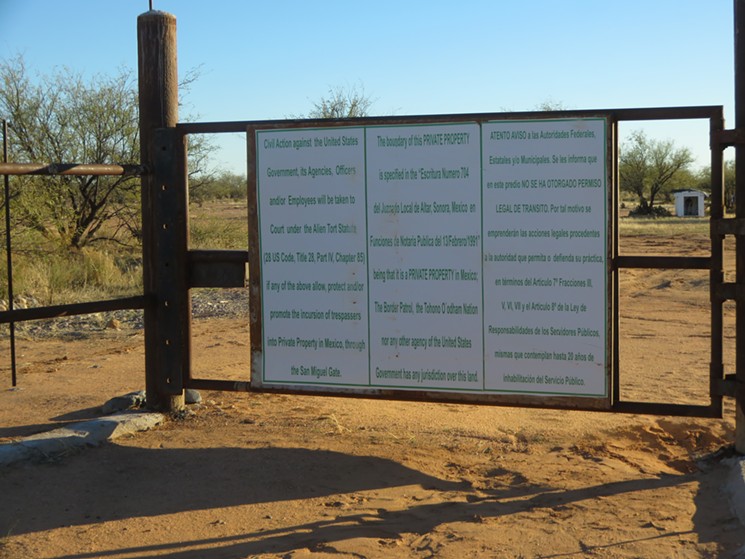 A sign erected last year on the Mexican side of the San Miguel Gate warns the U.S. government from promoting trespassing on private Mexican land. - RAY STERN