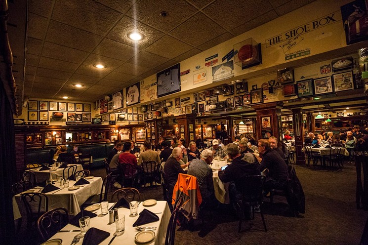 The dining room at Don & Charlie's, awash in sports memorabilia and nostalgia. - JACOB TYLER DUNN