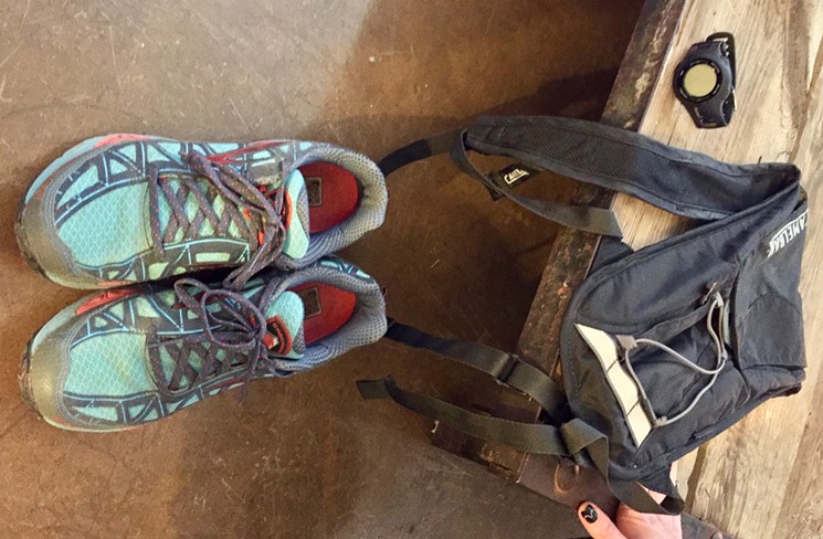 Malloy gets the gear – specifically Brooks Shoes from Runner's Den – for trail running in the desert. - LAUREN CUSIMANO