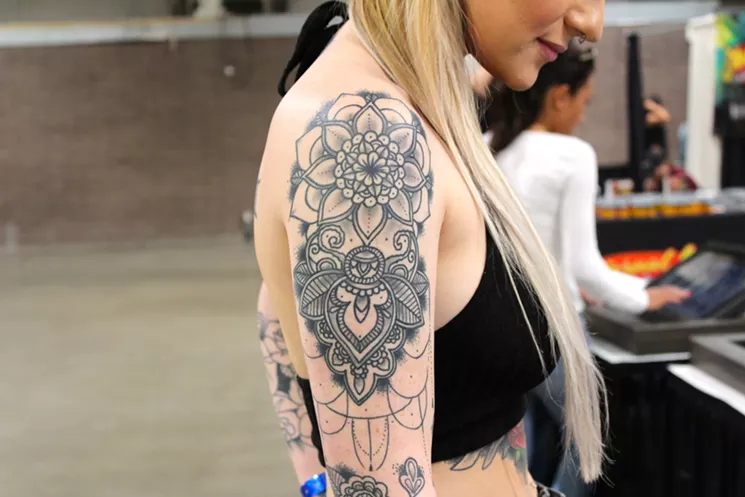 Rebecca Coleman's half-sleeve geometric tattoo by Don Hernandez of Tempe’s Ink Slinger Tattoo. - JUSTIN CRIADO