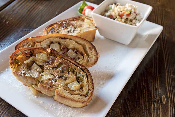 Don't miss the mignulatas. There are three versions of the southern Italian stuffed bread on the menu. - JACKIE MERCANDETTI