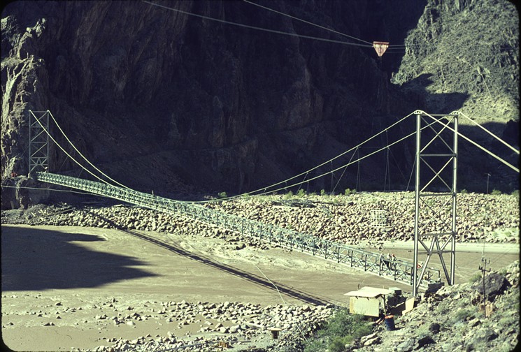 A circa 1965 Silver Bridge over the Colorado River. You'll cross this wobbly footbridge from Bright Angel Trail to get to the amenities at the bottom of the Canyon. It scares the snot out of me every time. - NPS PHOTO BY DAN COCKRUM/FLICKR CREATIVE COMMONS
